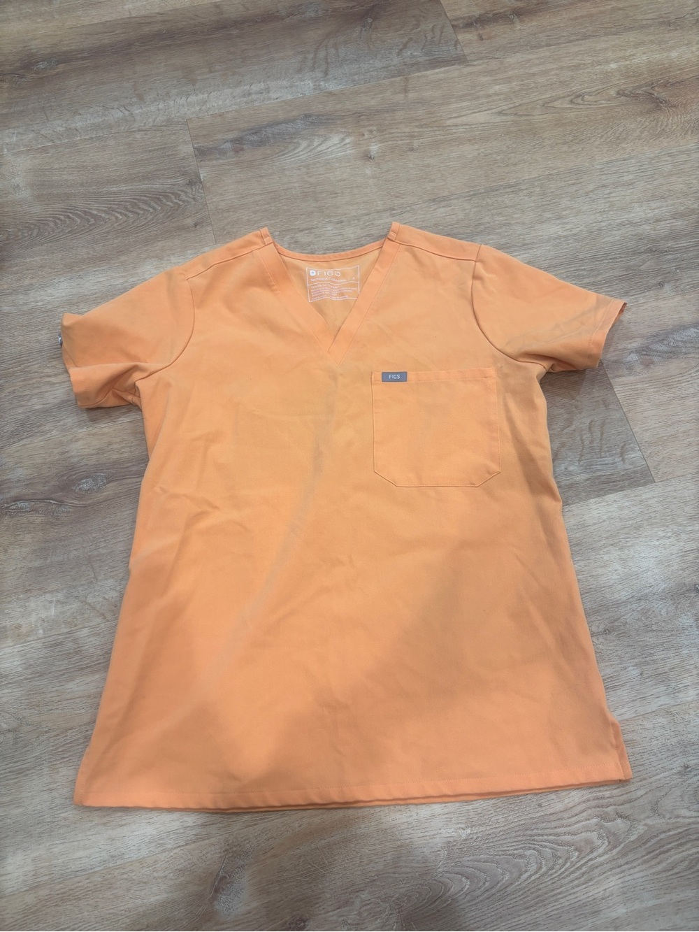 Figs Women's Short Sleeve V-Neck Scrub Top in Orange